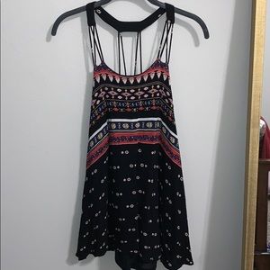 black patterned sleeveless dress